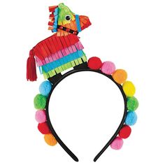 a colorful headband with pom - poms and a dog on the top