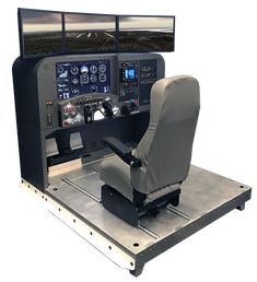 an airplane cockpit with two monitors and a chair