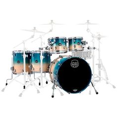 a drum set with blue and white paint on it's sides, including the drums