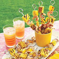 grilled shrimp and pineapple skewers with orange juice