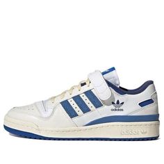 If you're looking for a sneaker that harkens back to the glory days of '80s hoops, then you need the adidas Forum 84 Low OG 'Bright Blue' in your life. This low-top sneaker features a white leather upper with blue suede three-stripes, an adjustable midfoot strap, and a vintage finish on the midsole. The blue rubber outsole comes complete with a red pivot circle, making this sneaker perfect for any basketball fan. (SNKR/Retro/Skate/Unisex/Low Top/Non-Slip/Wear-resistant) Adidas Forum Low Cl, Adidas Forum Low, Forum Low, Adidas Forum, Basketball Fans, Glory Days, Granola Girl, Blue Suede, Bright Blue