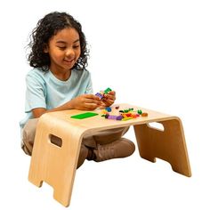 Elevate your child's learning and creativity with our Bentwood Floor Lap Desk, a must-have for every home. Crafted from real birch wood, its natural color exudes timeless elegance while ensuring durability that lasts for years. Portable and equipped with convenient handles, this desk is effortlessly transportable, making it perfect for classrooms, homeschools, playrooms, and beyond. The rounded edges prioritize safety, allowing kids to dive into various activities with peace of mind. From homework to arts, crafts, drawing, painting, or even snack time, this versatile desk accommodates every endeavor. Encourage exploration and unleash imagination with a space that's not just functional, but also fun and inspiring. Make the Bentwood Floor Lap Desk an essential addition to your home, where ev Lap Desk For Kids, Desk For Kids, Crafts Drawing, Floor Desk, Kid Desk, Lap Desk, Office Products, Educational Activities, Birch Wood