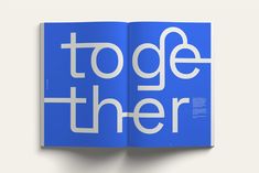 an open book with the words together in white letters on a blue background that says together