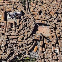 an aerial view of the ancient city of pompei in italy, looking down on it