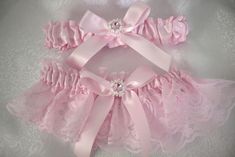 Listing includes a pale pink (Ice Pink) satin and pale pink lace bridal garter which includes yours to keep and one to toss.  The garter measures 3 1/2" wide.  Includes a pale pink rhinestone with delicate metal accent encircling. The color of the satin bows and satin gathering can be changed.   Includes a satin toss garter shown in pale pink ( Ice Pink) measures 1 1/2" wide.  This has a pale pink and clear rhinestone accent. More ribbon colors available.  Please contact me https://www.etsy.com/ Bridal Garter Pink, Goth Wedding Dresses, Pink Garter, Cute Converse Shoes, Halloween Fits, Bridal Garter Lace, Lace Garter Set, Goth Wedding, Wedding Garters