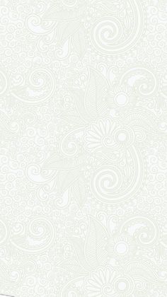 a white wallpaper with an intricate design