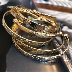 The Absolute Hottest Style Of The Season!! These Bangles 18k Gold Plated, Cuff, Stacking Bangle Bracelet Bundles Are A Perfect Gift For A Special Women. Treat Yourself Or A Loved One. These Unique Bracelets Will Enhance Any Outfit. All Bracelets Have A Diameter Of 7cm But Can Be Adjusted. All Bracelets Have A Width Of 5mm. Available In Silver And Gold The Bracelets Are Made From A High Quality Stainless Steel- Tarnish Free! #Lovebangle #Screwbangle #Nailbangle #Screwbangle #Lovebracelet Daily Wear Gold Bangles For Women, Gold Jewelry Stack, Bracelet Bundles, Pakistan Jewelry, Bangle Stacking, Xoxo Jewelry, Stacking Bangles, Dope Jewelry Accessories, Single Bracelet