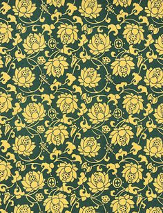 a green and yellow wallpaper with flowers on it