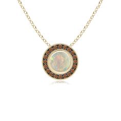 Exhibiting a sophisticated and luxurious look, the iridescent opal is surrounded by a halo of coffee diamonds in a black rhodium setting. On the rim of this round opal halo pendant is intricate milgrain work for a vintage touch. The intricate scrollwork adds to the fascinating look of this 14k yellow gold pendant. Halo Pendant, Black Rhodium, Yellow Gold Pendants, Opal Pendants, Diamond Halo, Halo Diamond, Bezel Setting, Gold Pendant, Halo