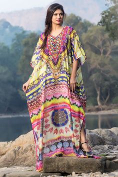 "ELEGANT , GORGEOUS & BEAUTIFUL ONE SIZE FIT ALL Beautiful hand embroider kaftans made with Rich quality of fabric & hand crafted by Skilled craftsmen. Fabric :- 100% Silk NATURE OF SILK One size. Fits size small to 6XL. Regular kaftan length is 60\" ( 153 cm ). (shorter kaftan length is possible Please let us know via email or put buyer note after purchase) Quality: Excellent (Best Quality On Our Stock) Absolutely Perfect for any Occasion... Be it a Relaxing Evening Entertaining Family/ Festive V-neck Hand Embellished Kaftan, Bollywood Style Dresses With Kimono Sleeves, Embellished Multicolor Kurta For Eid, Summer Festive Hand Embellished Kaftan, Bollywood Style Dabka Embellished Tunic Kaftan, Festive Summer Kaftan With Dabka Embroidery, Festive Dabka Kaftan For Festival, Festive Bohemian Kaftan With Dabka Detailing, Festive Bohemian Kaftan With Dabka