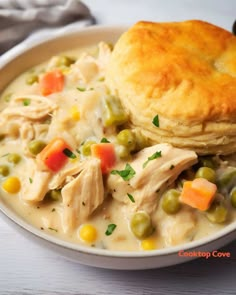 a white bowl filled with chicken pot pie