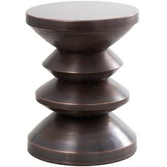 a brown metal stool with three tiers on the bottom and one in the middle