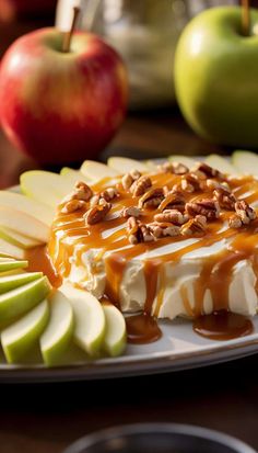 an apple dessert on a plate with caramel sauce and pecans around the edge