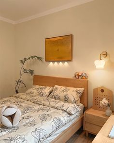 a bed room with a neatly made bed