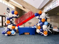 balloons and basketballs are on display in the lobby