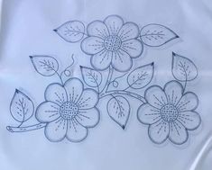 a drawing of some flowers on a white sheet