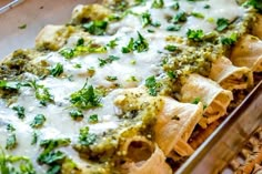 a casserole dish with broccoli and cheese