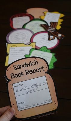 the sandwich book report is displayed on a table