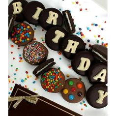 a birthday cake decorated with cookies and candies