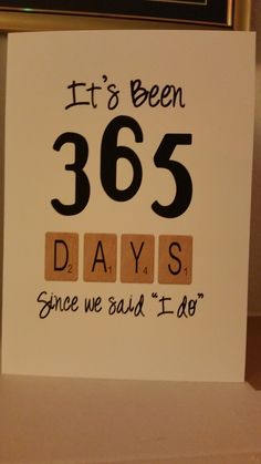 it's been 365 days since we said i do by the numbers on this sign