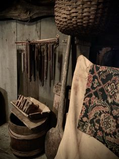 an old wooden chair sitting next to a basket