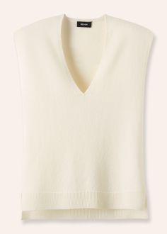 Soft, lightweight cashmere and warm merino wool grant this Cream Merino Cashmere Relaxed V Neck Vest by ME+EM easy adaptability and transeasonal versatility layered over shirting or camis throughout the year. Ground the ethereal cream colourway with dark- Knitted Vests, Cream Vest, V Neck Vest, Layering Cami, Ankle Sleeve, Floral Shoes, Layering Tanks, Layered Tops, Shearling Coat