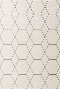 a white rug with an abstract design on the bottom and grey lines in the middle