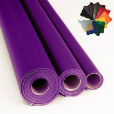 purple yoga mat rolled up on top of each other with various colors and sizes to choose from