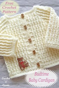 a knitted cardigan with teddy bear on it