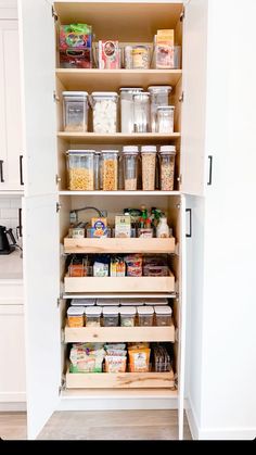 an organized pantry with lots of food in it