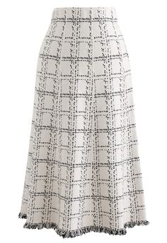 The grid trend is back like it never left and this simple yet stylish grid fringe hem skirt is one stylish way to try it. Style it with an off-shoulder sweater and over-the-knee boots to give the vintage-inspired design an easy modern feel.    - Grid pattern  - Flare fringe hem  - Elastic waistband  - Knit fabric provides flexibility  - Not lined  - 100% Acrylic  - Hand wash cold            Size  Length  Waist      S-M  cm  73  64-88      inch  28.5  25-34.5 Bridesmaid Dresses Ideas, Skater Outfits, Chanel Skirt, Sequence Work, Off Shoulder Sweater, Dresses Ideas, Hem Skirt, Grid Pattern, Vintage Inspired Design