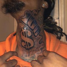 a man with a dollar tattoo on his neck