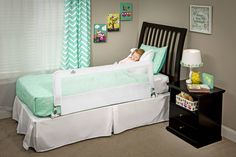 If you would label your toddler as a “wild sleeper”, give the Regalo HideAway Extra Long Bed Rail a try. It is an ideal solution for children who need a little extra protection from rolling out of bed. The all-steel bed rails measure 20” high so they can easily accommodate thick mattresses and extend an impressive 54” to provide the utmost coverage of the bed. Bed rails for toddlers can be an eye sore, so we’ve implemented our patented Glide Trac System. It allows the rail to tuck under the matt Safety Bed, Bed Rails For Toddlers, Rail Guard, Bed Rail, Long Bed, Steel Bed, Toddler Beds, Queen Mattress Size, Bed Rails