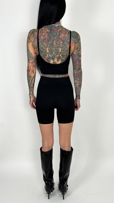 We love a solid biker short action. Super stretchy and comfy and holds errrrthang in. These babies are ribbed (for her pleasure). IYKYK. Just a little added touch to take a basic biker short to the next level. Perfect to pair with your favorite oversized graphic tee or under a mini dress so your kitty isn't saying hi to everyone. Fit: True to size Model is: Height: 5'6" Waist: 25” Hips: 31.5" Chest: 32C Wearing size S/M Material: 92% Nylon 8% Spandex Paired with: Valencia V Brami Apparel size ch Seamless Fitted Athleisure Biker Shorts, Sporty Biker Shorts With Seamless Construction, Seamless High Stretch Biker Shorts, Mid-thigh Length, Seamless High Stretch Biker Shorts, Seamless Stretch High-waisted Biker Shorts, Seamless Construction Biker Shorts For Loungewear, Loungewear Seamless Biker Shorts, Fitted Biker Shorts For Workout With Seamless Construction, Athleisure Seamless Stretch Biker Shorts