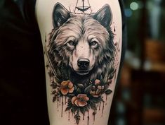 a wolf with flowers and a ship in the background on a woman's thigh