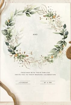 an image of a wedding card with greenery