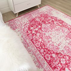 a red and white rug in a room