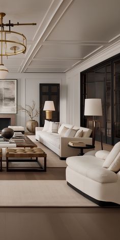 a living room filled with lots of white furniture