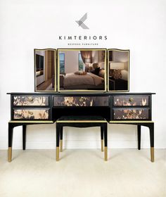 a black and gold dresser with pictures on it