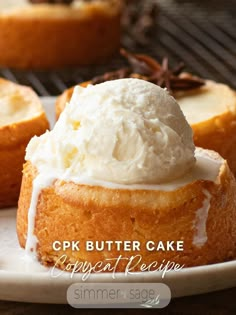 a close up of a cake on a plate with whipped cream and star anise