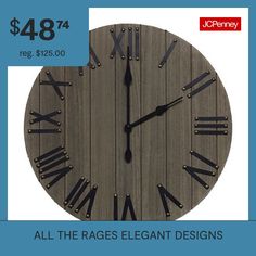 a large clock with roman numerals is on sale for $ 487 00