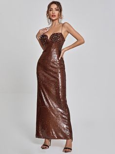 Feel like a million bucks in the Lorelei Brown Sequin Dress! This sequin occasion piece features a lovely maxi length, and a flirty split at the back. Perfect for those super special events coming up, pair this beauty with strappy heels, a clutch and statement jewellery to complete the look! Material: Sequin (100% Polyester) Invisible zipper opening at the back Stretch Factor: Slight Stretch Clean: Dry clean only Color may vary due to the lighting on images. The product images (without model) ar Luxury Shimmer Sequin Dress, Bronze Sequin Maxi Dress, Gold Dress With Heels Cognac, Revolve Bronze Dress, Luxury Fitted Sequin Dress With Shimmer, Brown Glitter Dresses Formal, Pageant Dresses Brown, Luxury Glamorous Brown Dresses, Luxury Brown Formal Dresses