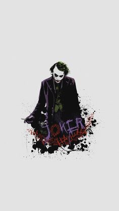 the joker is sitting down with his hands in his pockets