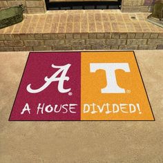 a door mat with the word a house divided on it