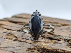 Rare Hematite  ring. 10k White Gold, Marked but has been tested. Beautiful claw setting around the hematite. 2.0grams total 7mm by 15mm marquise Hematite Size 5.25 Hematite Rings, Hematite Jewelry, Hematite Ring, Claw Setting, Cabochon Ring, Sarasota Fl, Gold Earrings Studs, Gold Studs, 10k Gold