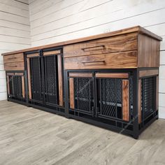 the sideboard is made out of wood and has metal bars on each paneling