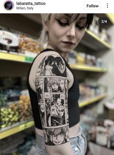 a woman with a tattoo on her arm in front of a store shelf full of food