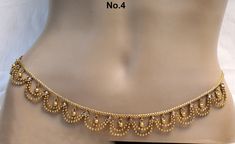 * Beautifully designed gold color belly chain. * can be used with belly dance costumes and saris. * D.no.1- Adjustable from32 to 40 inches Waist. * D.no.2- Adjustable from 32 to 40 inches Waist. * D.no.3- Adjustable from 32 to 40 inches Waist. * D.no.4- Adjustable from 24 to 36 inches Waist. Golden Kamarbandh, Waist Band Jewellery Indian, Gold Bollywood Waist Chain For Wedding, Bollywood Gold Waist Chain For Weddings, Bollywood Style Gold Waist Chain For Wedding, Gold Bollywood Waist Chain For Festivals, Gold Waist Chain For Festivals And Parties, Traditional Gold Waist Chain For Festive Season