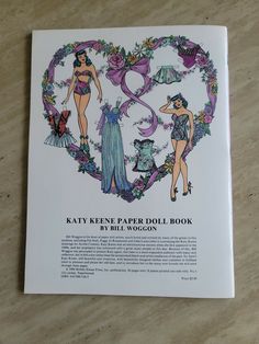 a book with an image of two women in swimsuits and flowers on the cover