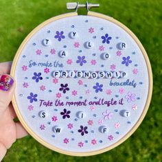 someone is holding up a cross stitch embroidery project that says, i love you so much